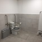 The accessible toilet and the screen in the facility