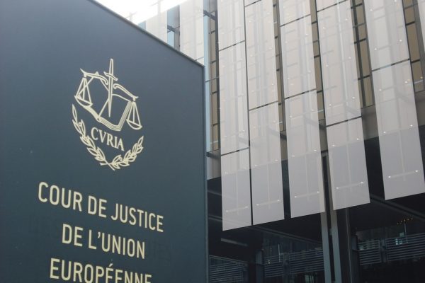 A picture of the sign of the Court of Justice of the EU outside the building in Luxembourg