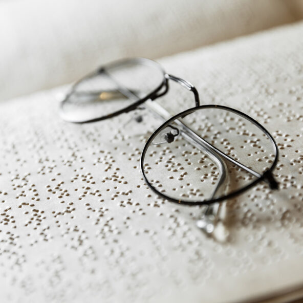 Glasses on a braille document